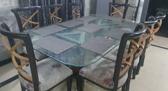 dining table with 1" thick glass, along with 8 chairs