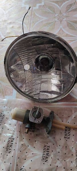 Suzuki 150 Headlight 2