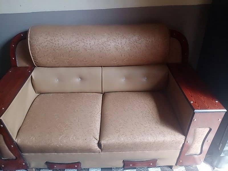 urgent sale 4 seater sofa set with covers 2
