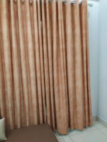 sofa cum bed & matching curtains 1