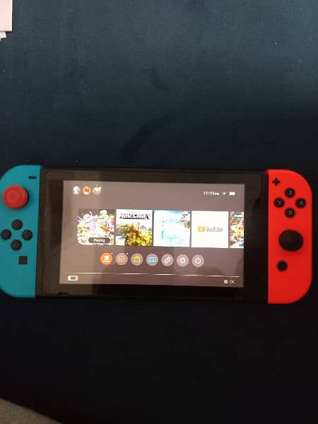 NINTENDO SWITCH WITH GAMES 0