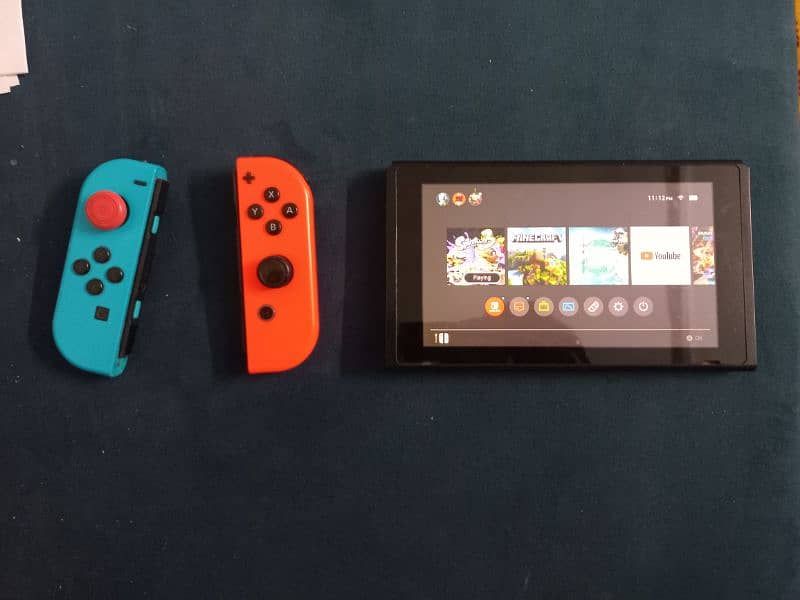 NINTENDO SWITCH WITH GAMES 1