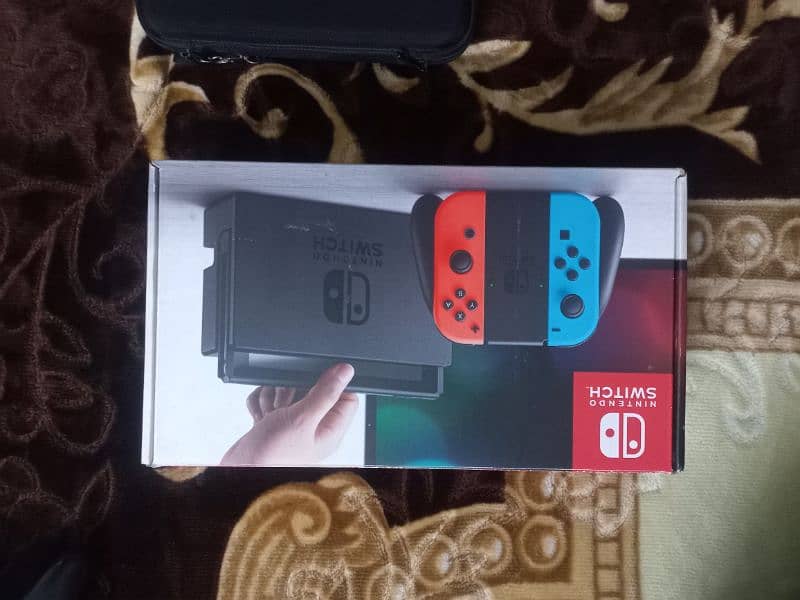 NINTENDO SWITCH WITH GAMES 4