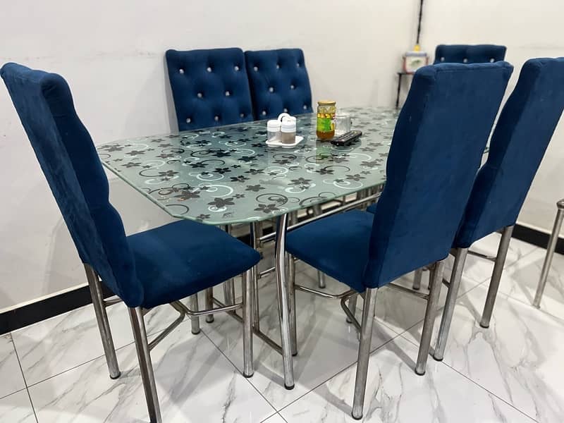 6 Seater Glass Dining table with metallic frame chairs 0