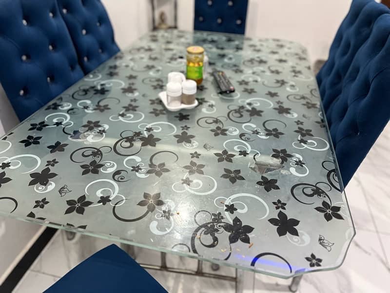 6 Seater Glass Dining table with metallic frame chairs 1