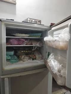 refrigerator in use condition. 8/10 condition