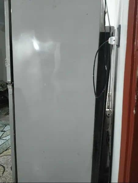refrigerator in use condition. 8/10 condition 2
