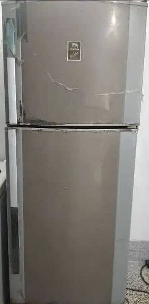 refrigerator in use condition. 8/10 condition 3