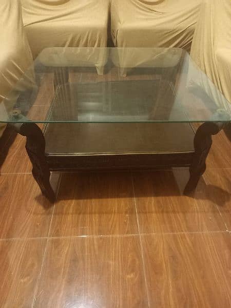 wooden tables,2 sides tables ,one center table slightly used 0