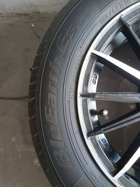 alloy rim and new tyer 15" 100 pcd 1