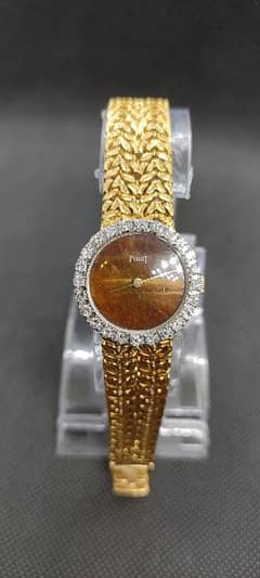 PIAGET 18k Gold and Diamond watch