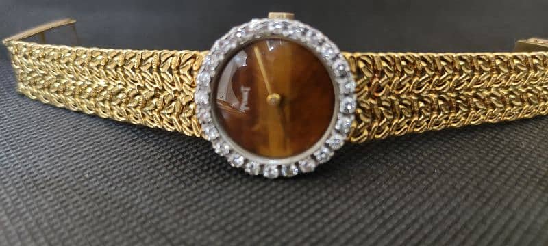 PIAGET 18k Gold and Diamond watch 8