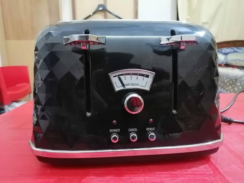 Delonghi 4 Slice Toaster , Imported 0
