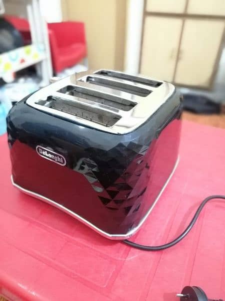 Delonghi 4 Slice Toaster , Imported 5