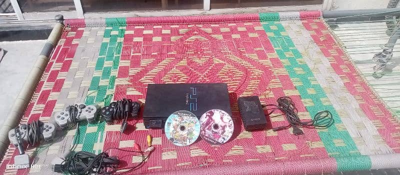 playstation 2 with 3 controller 2