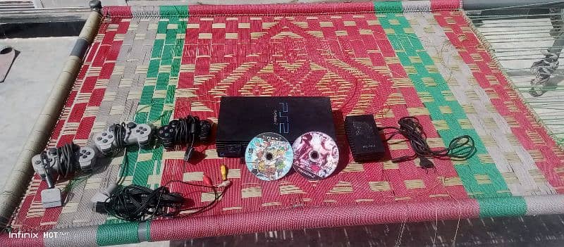 playstation 2 with 3 controller 3