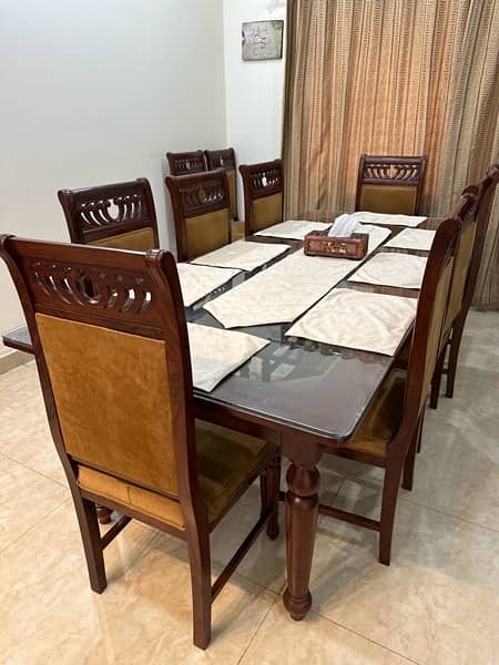Dining table of 8 chairs, 2 extra also available 1