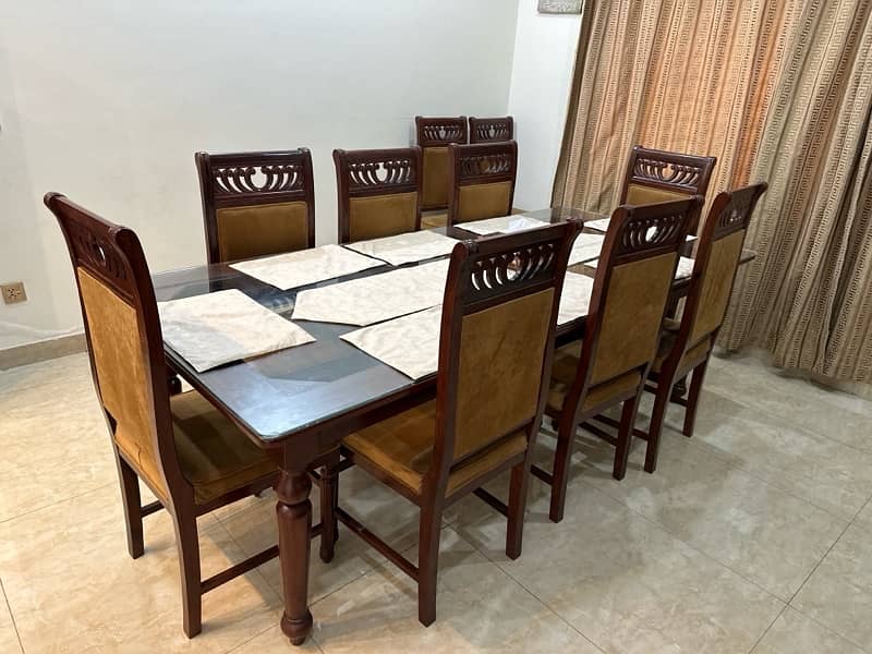 Dining table of 8 chairs, 2 extra also available 2