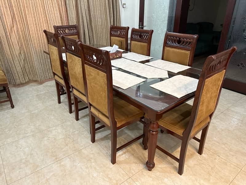 Dining table of 8 chairs, 2 extra also available 3