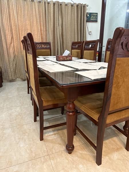 Dining table of 8 chairs, 2 extra also available 4