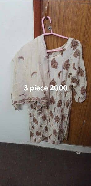 lawn and raw silk dresses on a urgent sell 18