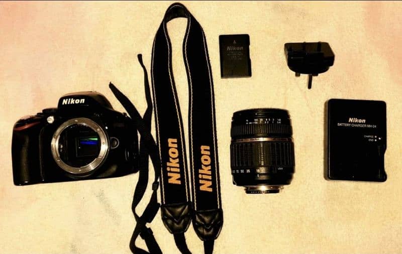 Nikon D5100 with tamron af 18-200mm 0