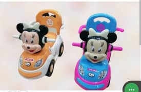 Mickey mouse is a four wheel push car. 0