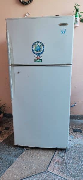 a full size national company fridge in working condition 0