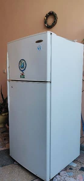 a full size national company fridge in working condition 1