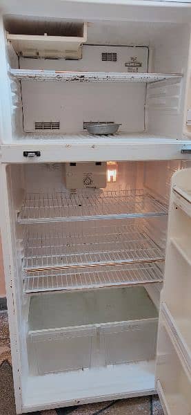a full size national company fridge in working condition 5