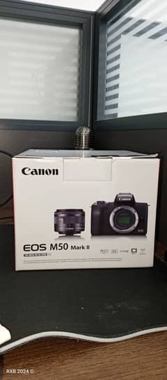 Canon M50 mark ii with kit lens and limited edition Canon backpack