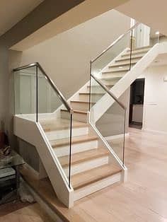 Staircase railing design /Glass stair panels Modern staircase railing