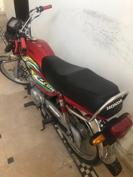 lush condition new motor cycle red in colour 0