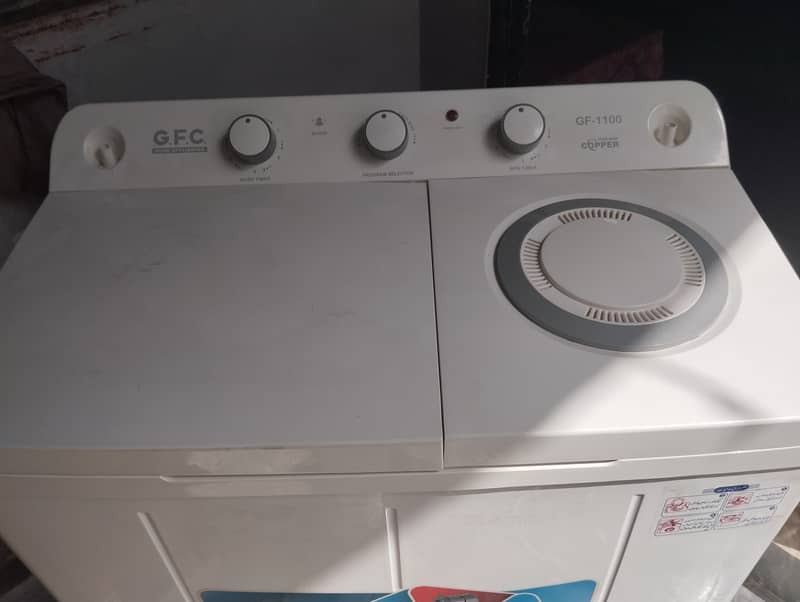 GFC washer dryer good condition one time use 2 month check warranty 4