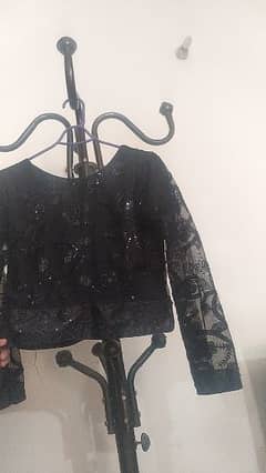 black embroidered saree with silk pati coat