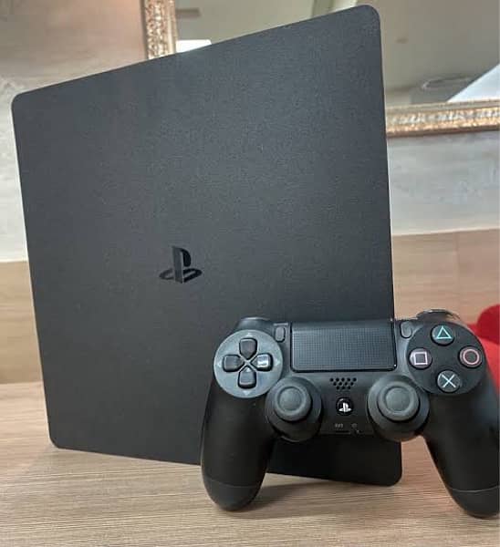 ps4 slim with box 2 controller 1