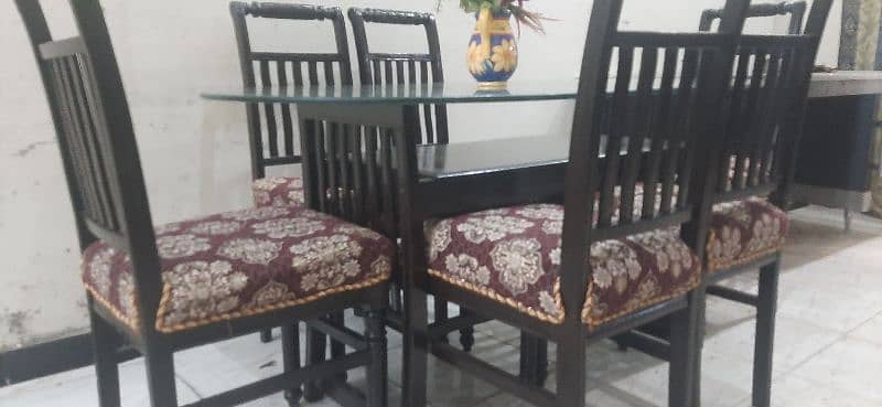 6chairs wooden dinning in excellent condition all ok with  12mmglass 5