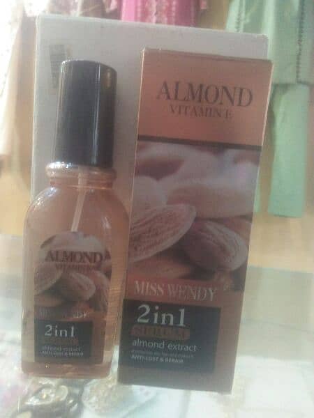 Almond  Vitamin E Serum jo Kra hair ko silky or shine 0
