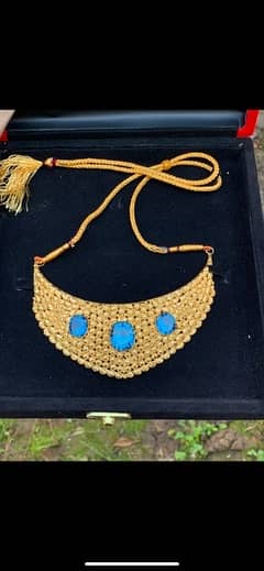 gold necklace and london topaz