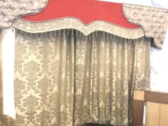 two curtains with pelmets