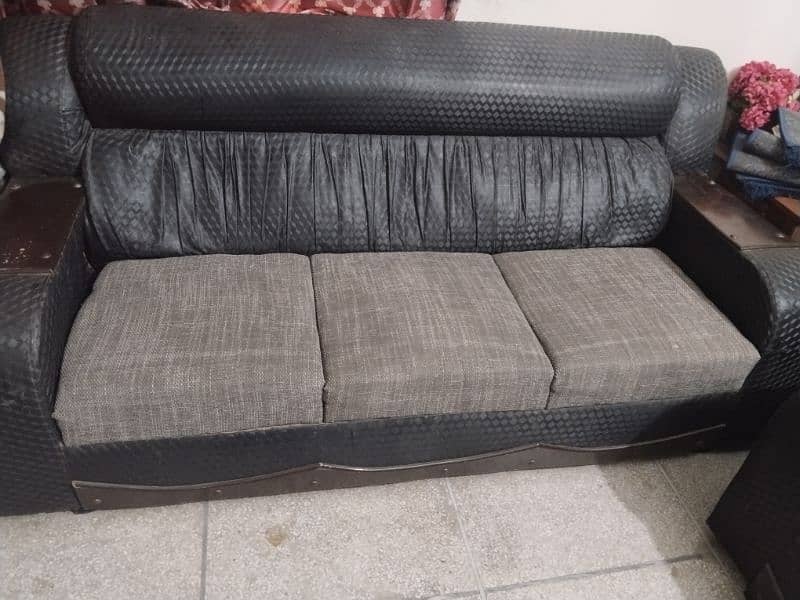 black and gray color sofa 1