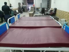 Hospital bed with mattresses