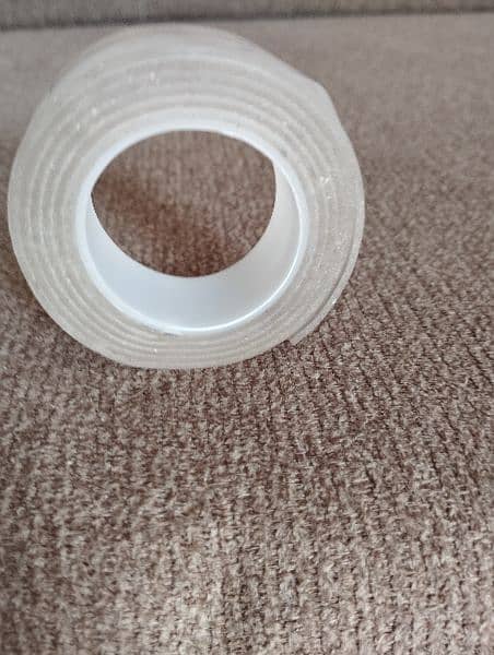 Double sided tape 2 meter length
Width 1.8 cm 
Brand . . china imported 2