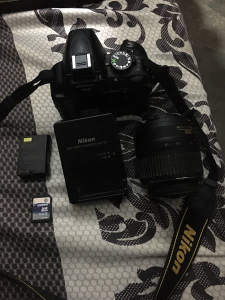 Dslr Nikon D3100 ok condtion 10/10 batery,charger and 4gb memrycard 3