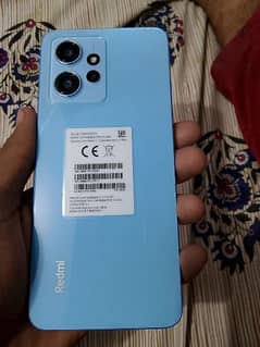 readmi note 12 condition 10/10 a 7month warnty with box and charge