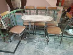 Glass dining table with 5 chairs