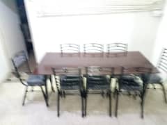 Dining Table with 8 seats table is just like new and seats are new