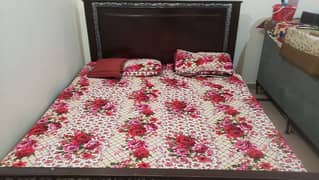 wooden king size bed  in good condition very less used