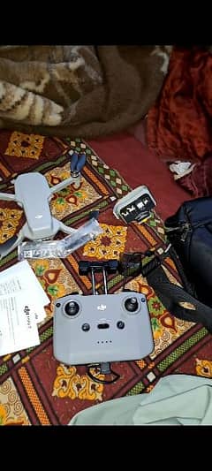 Dji mini 2 only 6 month use drone likes new all spare accessories avlb