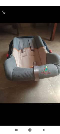 Baby car seat/ carry cot